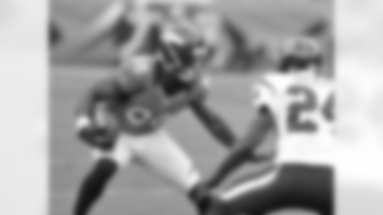 WR Demaryius Thomas looks for extra yardage after a catch.