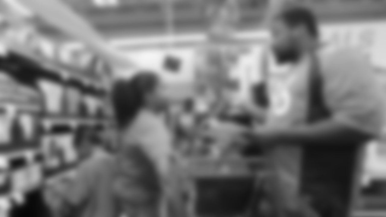 Shelby Harris with kids from the Denver Broncos Boys & Girls Club during the fourth annual Back to School with the Broncos shopping spree at King Soopers on July 16, 2019.