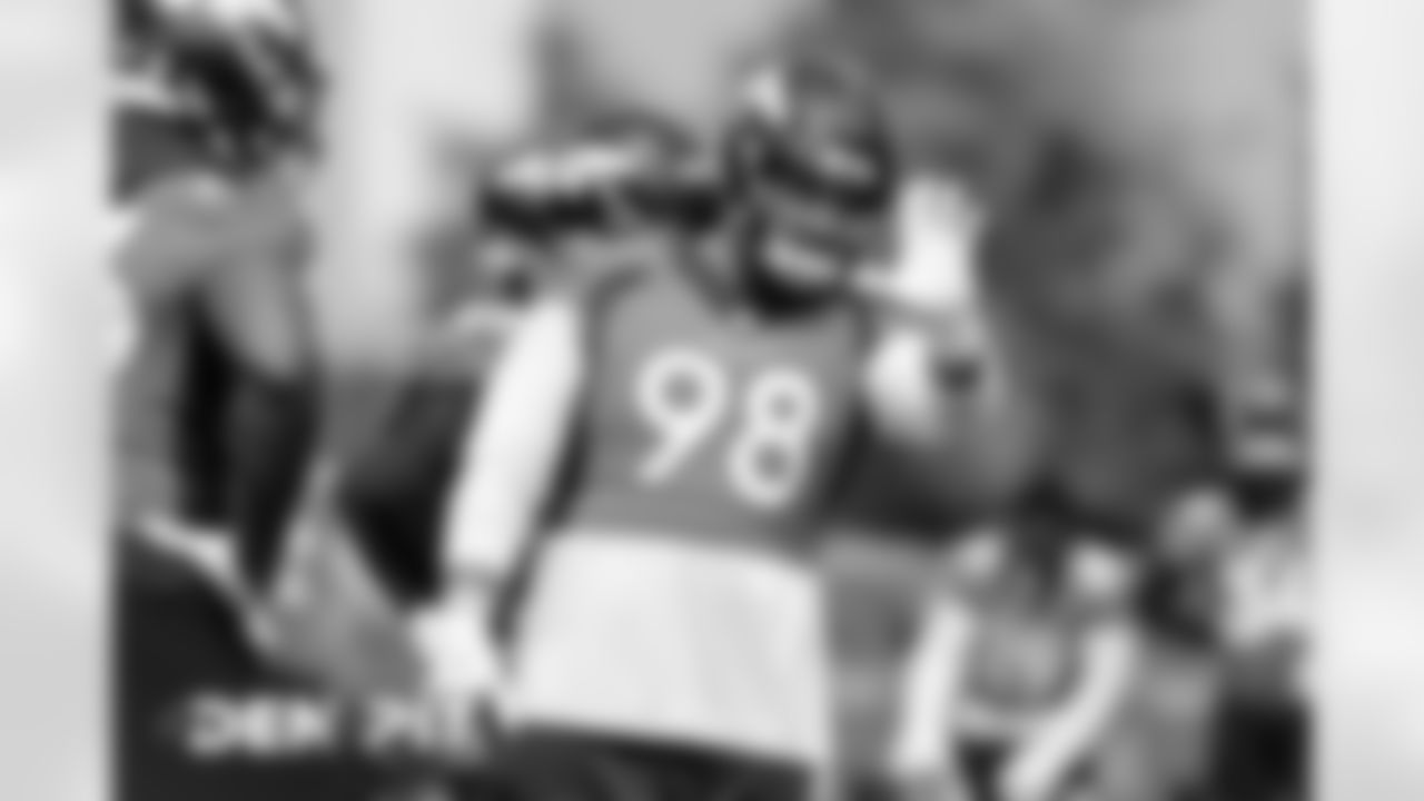 Mike Purcell waves during practice at UCHealth Training Center on September 18, 2020. (Photo by Ben Swanson)