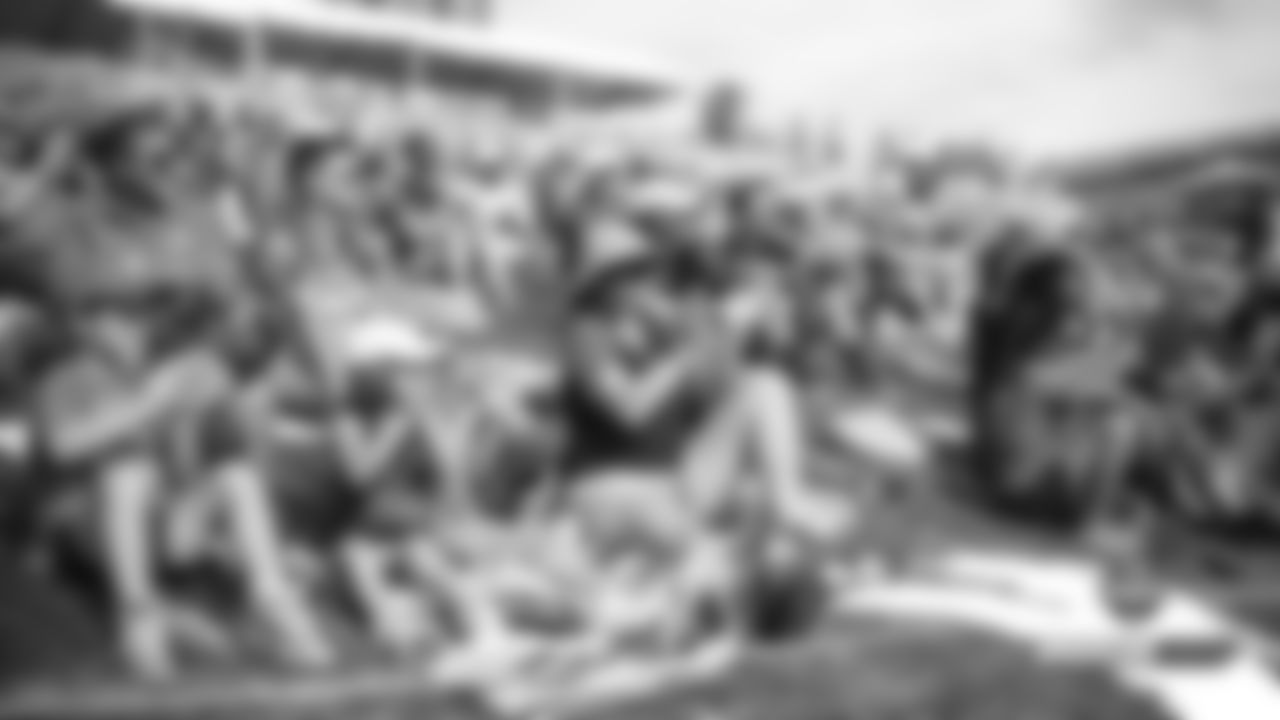 Fans applaud during practice on Day 11 of training camp on July 30, 2019.