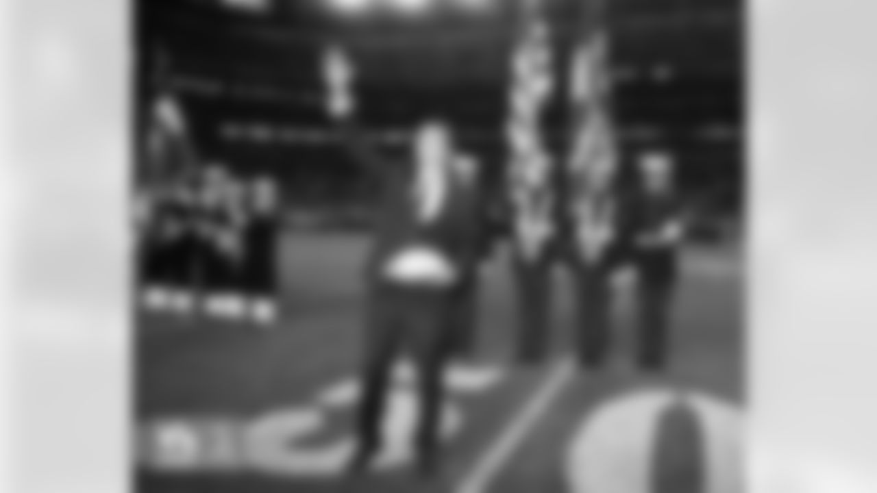 A military member is honored during the game against the New York Jets on November 17, 2011 at Sports Authority Field at Mile High in Denver, CO.
