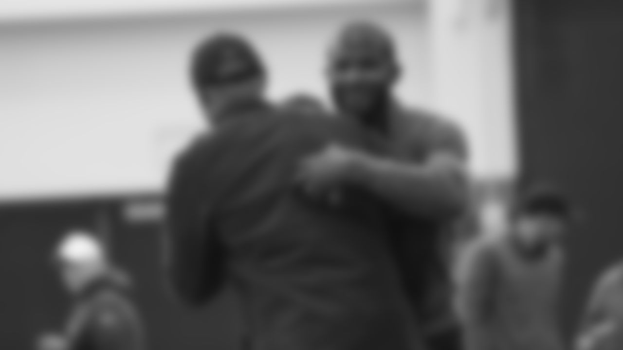 Pro Football Hall of Fame and Broncos Ring of Fame cornerback Champ Bailey greets fellow Hall of Fame James Lofton at practice on October 11, 2019 at UCHealth Training Center. (Photo by Ben Swanson)