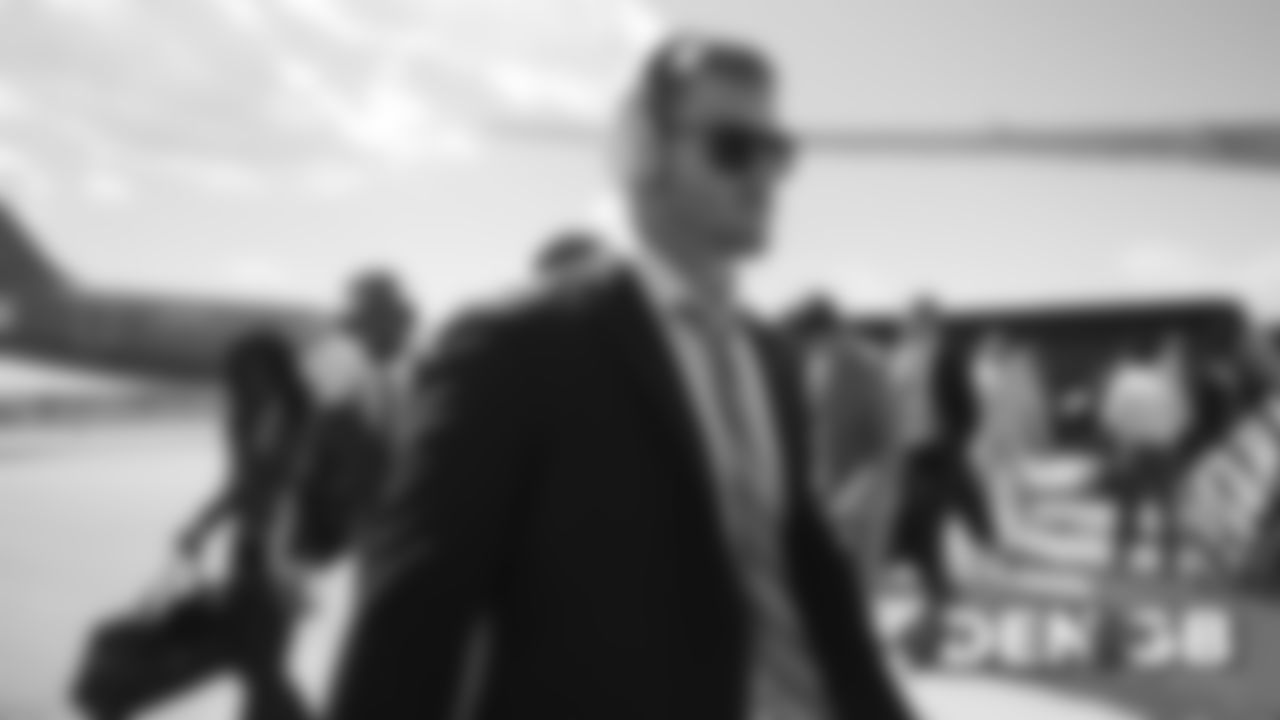 Andrew Beck on the tarmac at Denver International Airport during the team's travel to Wisconsin on September 8, 2019 ahead of their Week 3 game against the Green Bay Packers. (Photo by Ben Swanson)