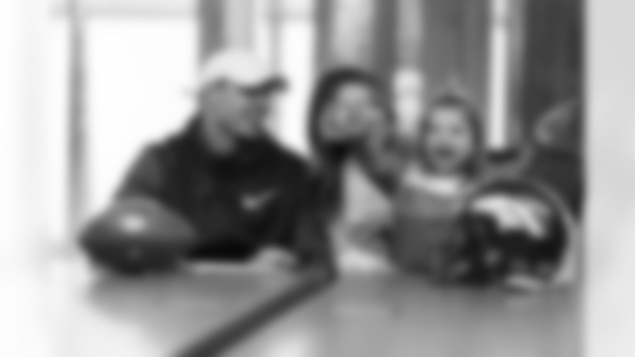 Justin Simmons is joined by his wife, Taryn Simmons, and their daughter, Laney, as he signs his new long-term contract on March 19, 2021.
Photo by Gabriel Christus