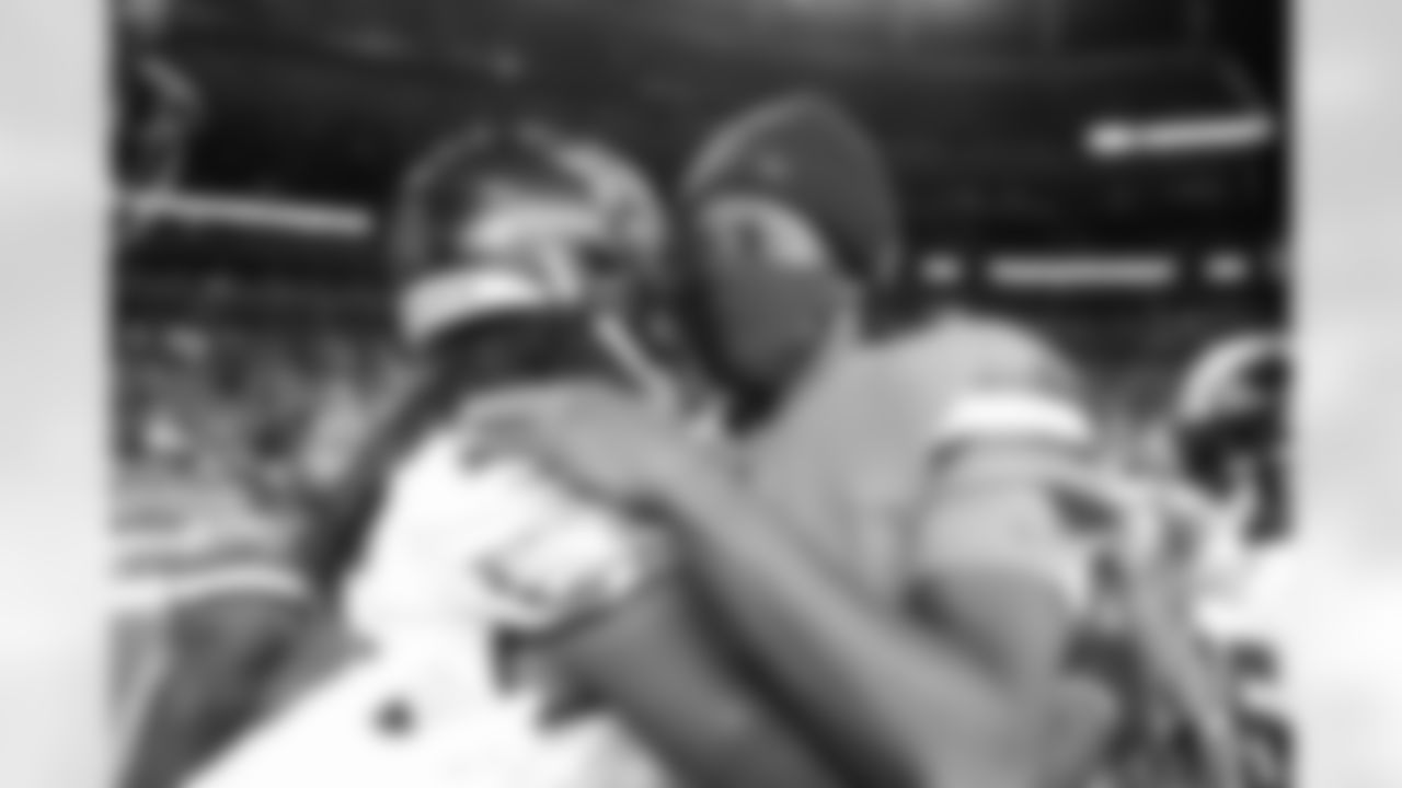 Teddy Bridgewater and Philadelphia Eagles safety Anthony Harris (28) after the Broncos' Week 10 game against the Philadelphia Eagles at Empower Field at Mile High in Denver, Colorado on November 14, 2021. (Photo by Gabriel Christus)