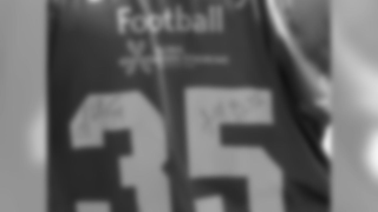 The camper's jersey with Franklin's and Jackson's autographs.