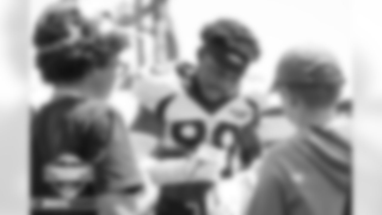 Jonathan Kongbo signs autographs for fans at practice on Day 5 of training camp at UCHealth Training Center in Englewood, Colorado on August 1, 2022. (Photo by Ben Swanson)