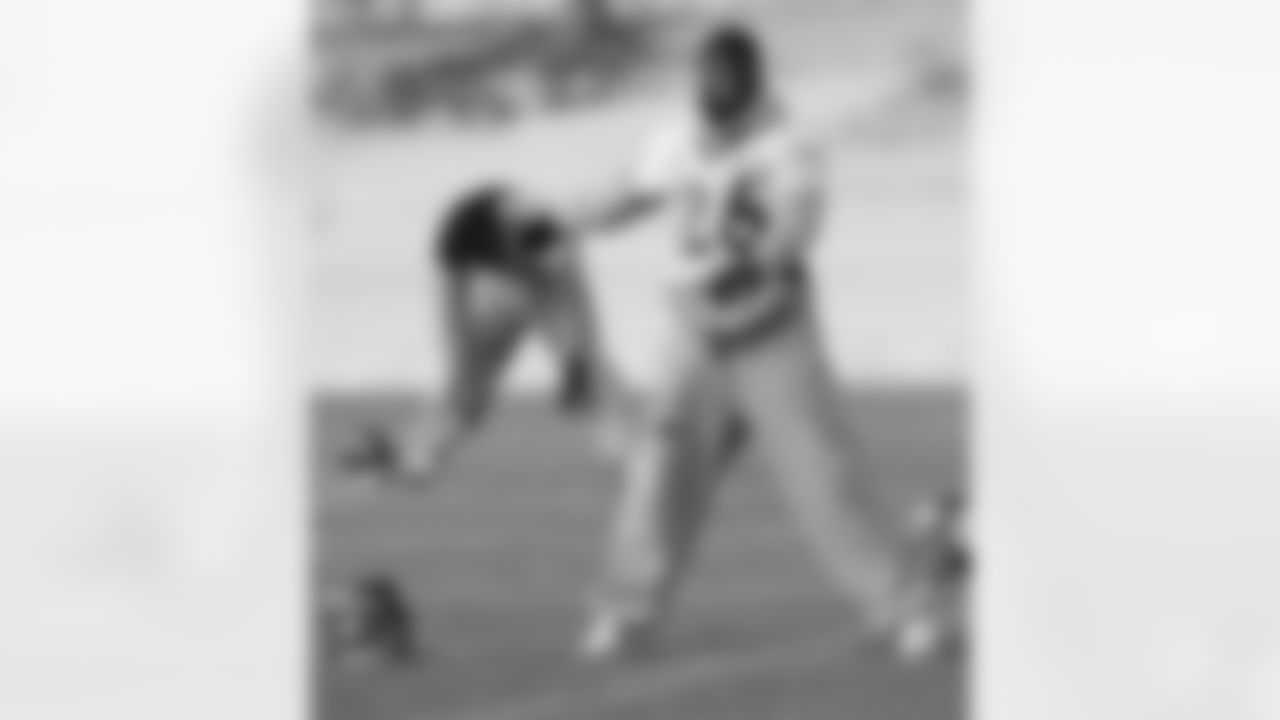 S Rahim Moore laughs while stretching.
