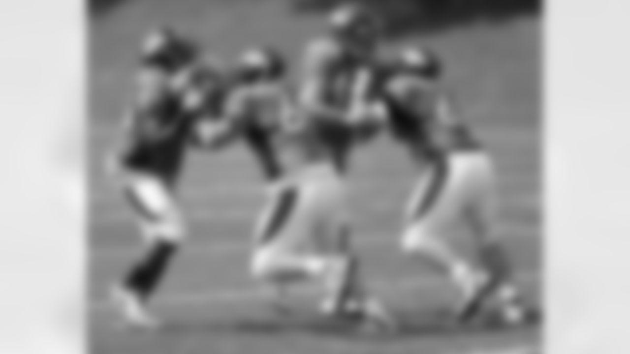The offensive line works through a drill.