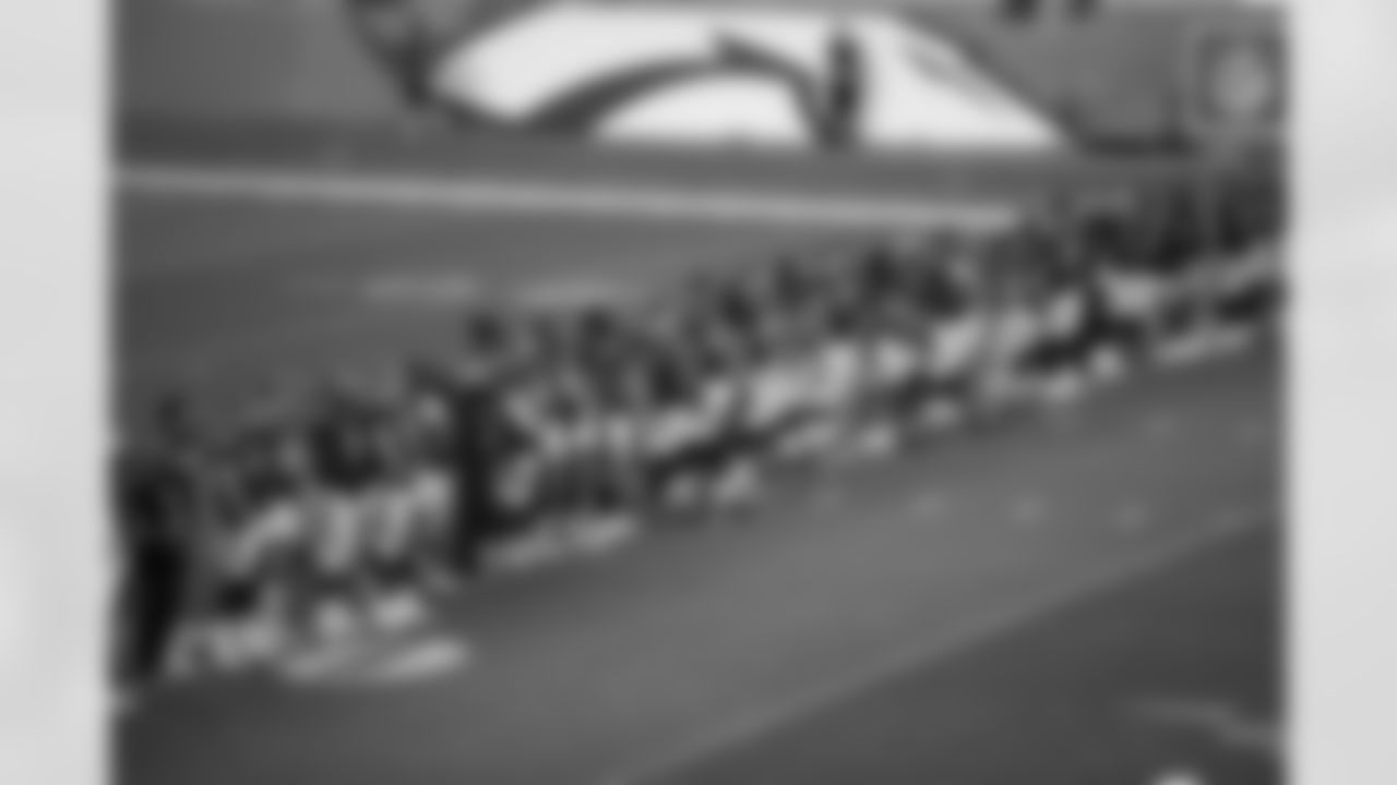 The Denver Broncos Stand to watch a presentation about social injustice before the NFL football game against the Tennessee Titans at Empower Field at Mile High in Denver, Colorado, September 14, 2020.
Photo by Gabriel Christus