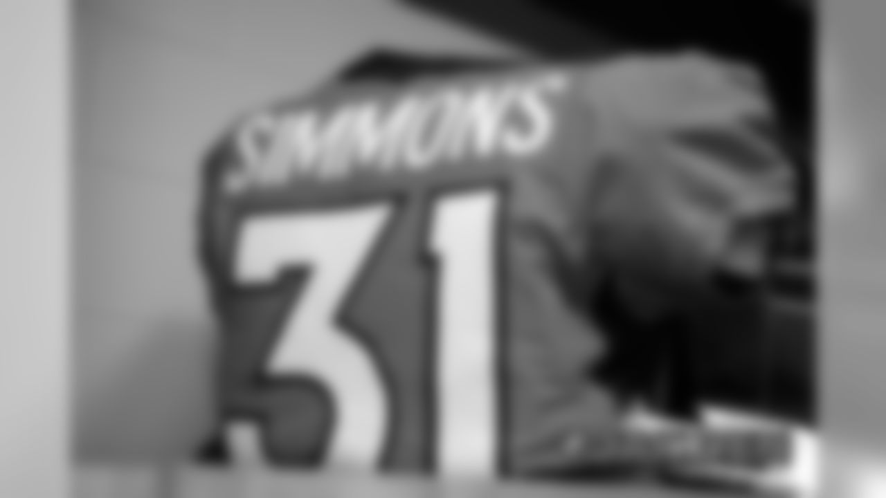 Justin Simmons's jersey in the locker room before the Denver Broncos' Week 17 game against the Oakland Raiders at Empower Field at Mile High on December 29, 2019. (Photo by Ben Swanson)
