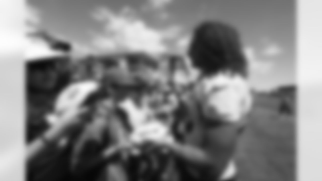 Greg Dulcich signs autographs for fans during training camp on Friday, July 28, 2023 at Centura Health Training Center in Englewood, Colorado.
Photo by Gabriel Christus / Denver Broncos
