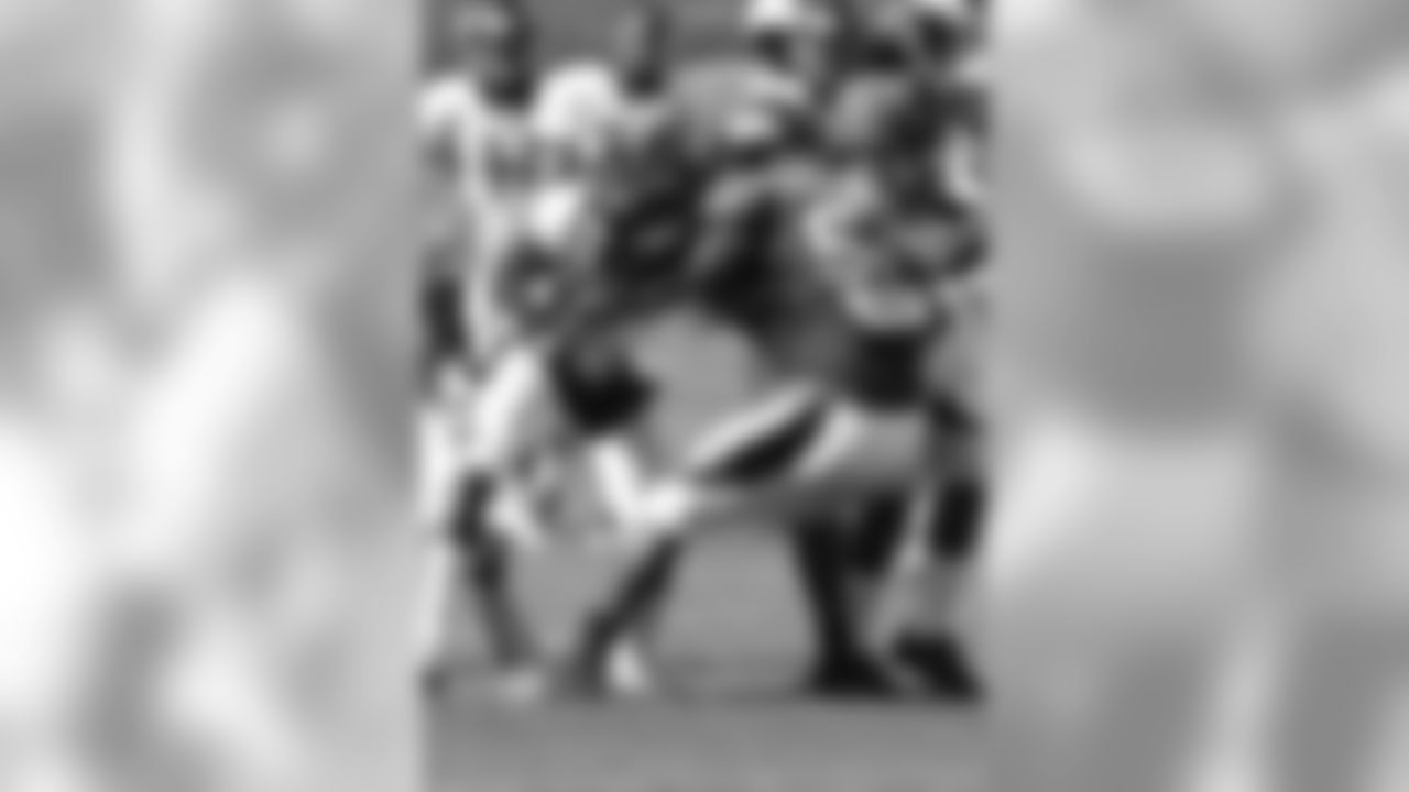 WR Isaiah Burse and LB Brandon Marshall