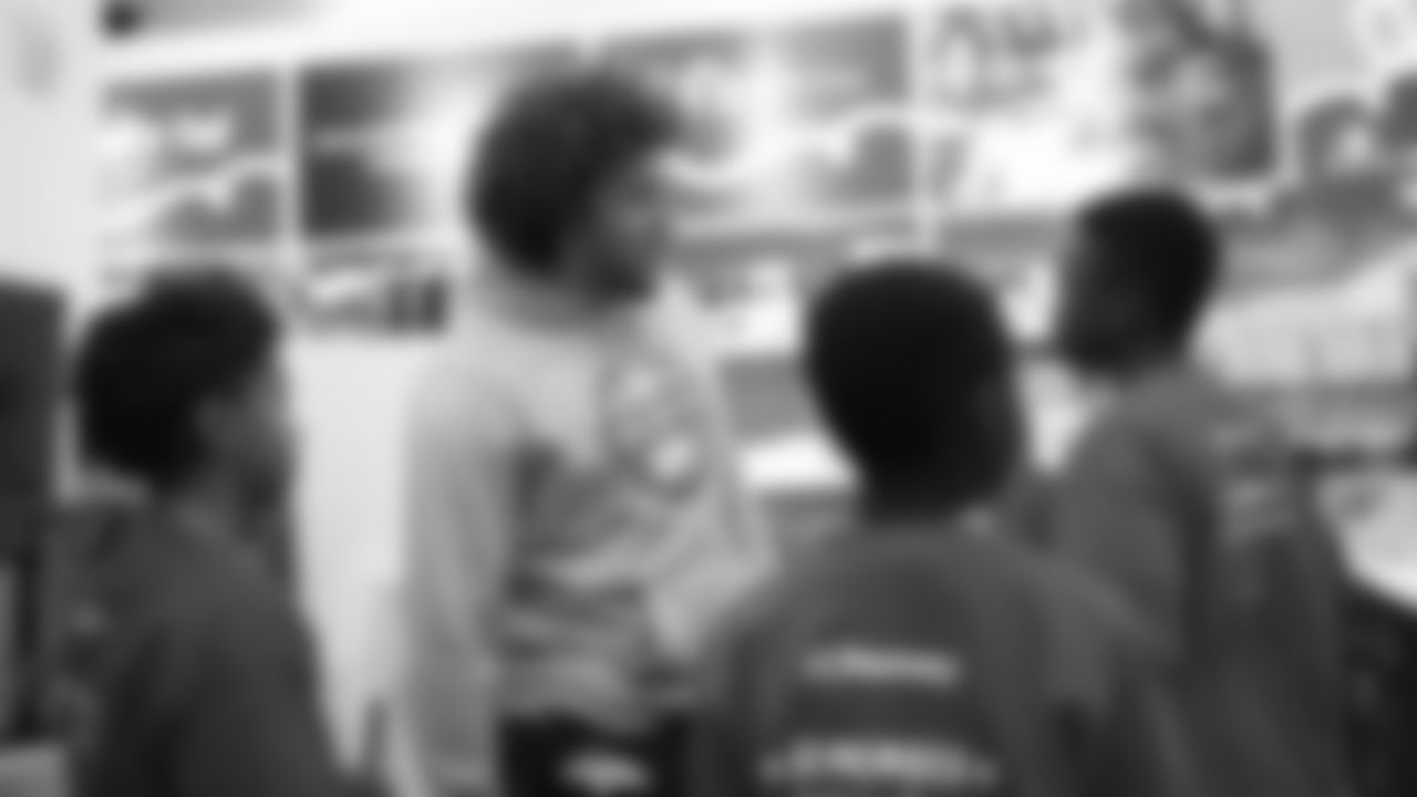 Phillip Lindsay surprises children from the Denver Broncos Boys & Girls Club with a shopping spree at a department store on December 2, 2019. (Photo by Ben Swanson)