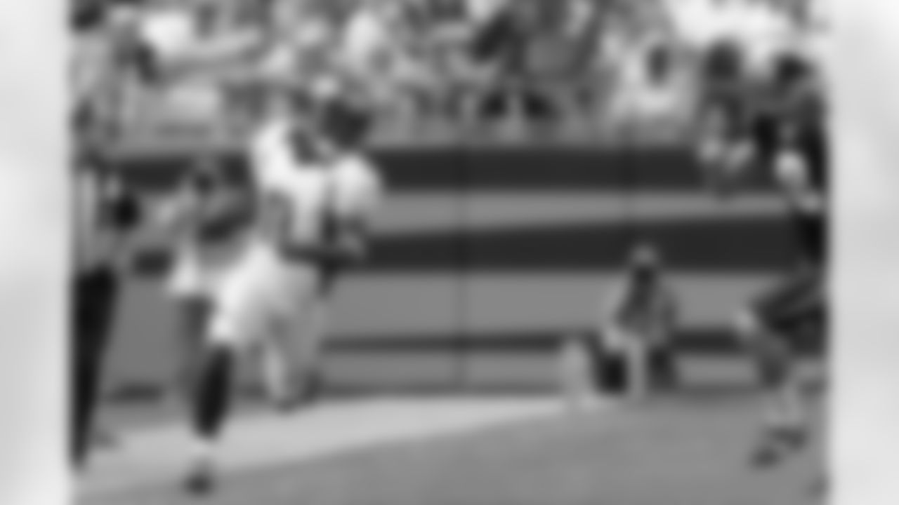 Trindon Holliday returns a punt 76 yards for a touchdown at Carolina.