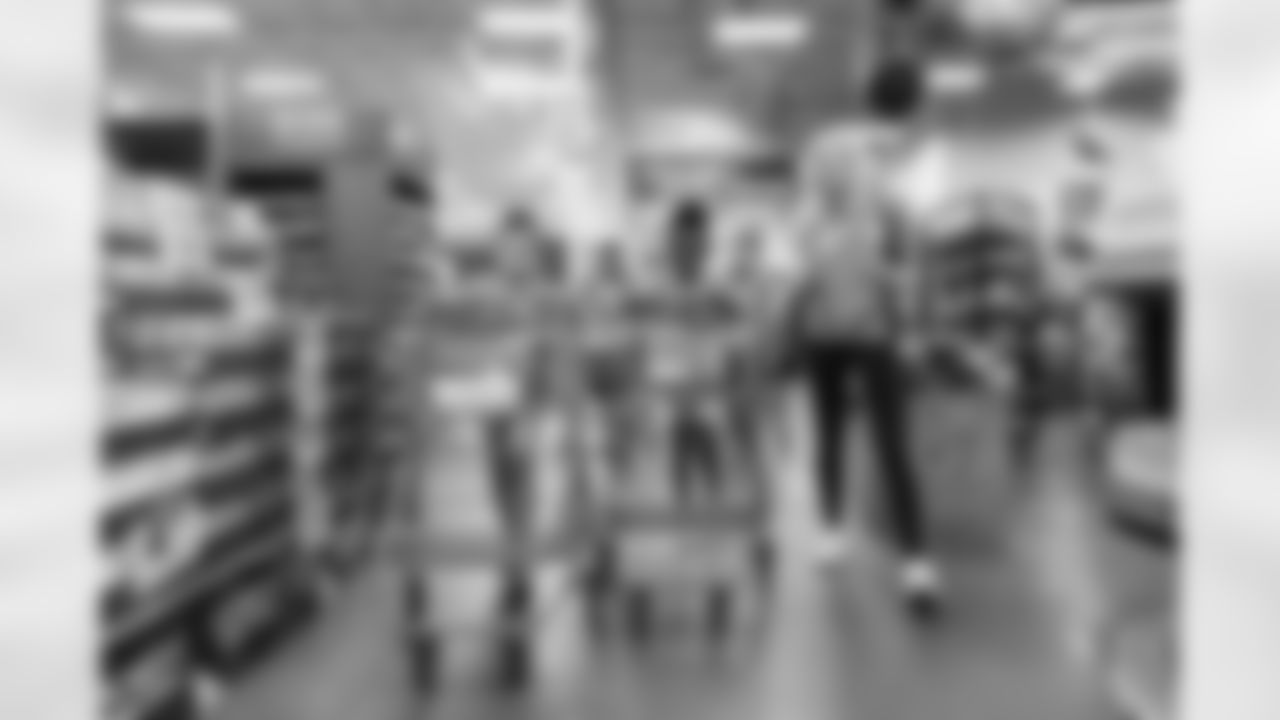 Denver Broncos Cheerleaders and Broncos alumni help children go back-to-school shopping at King Soopers Marketplace in Parker, Colorado on July 26, 2022. (Photo by Joe Abdellah)