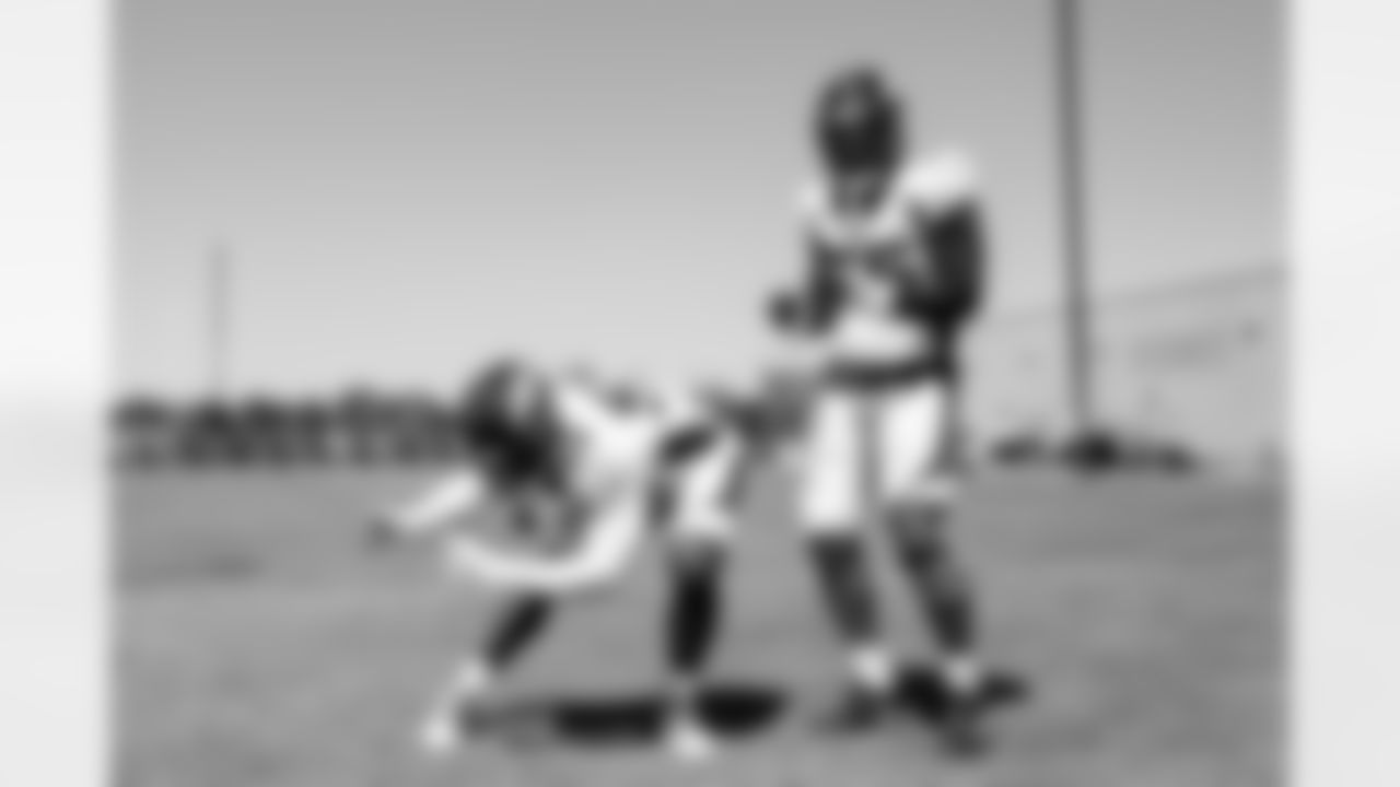 Von Miller and Bradley Chubb dance during a joint practice with the Minnesota Vikings amid training camp at TCO Performance Center on August 11, 2021. (Photo by Ben Swanson)
