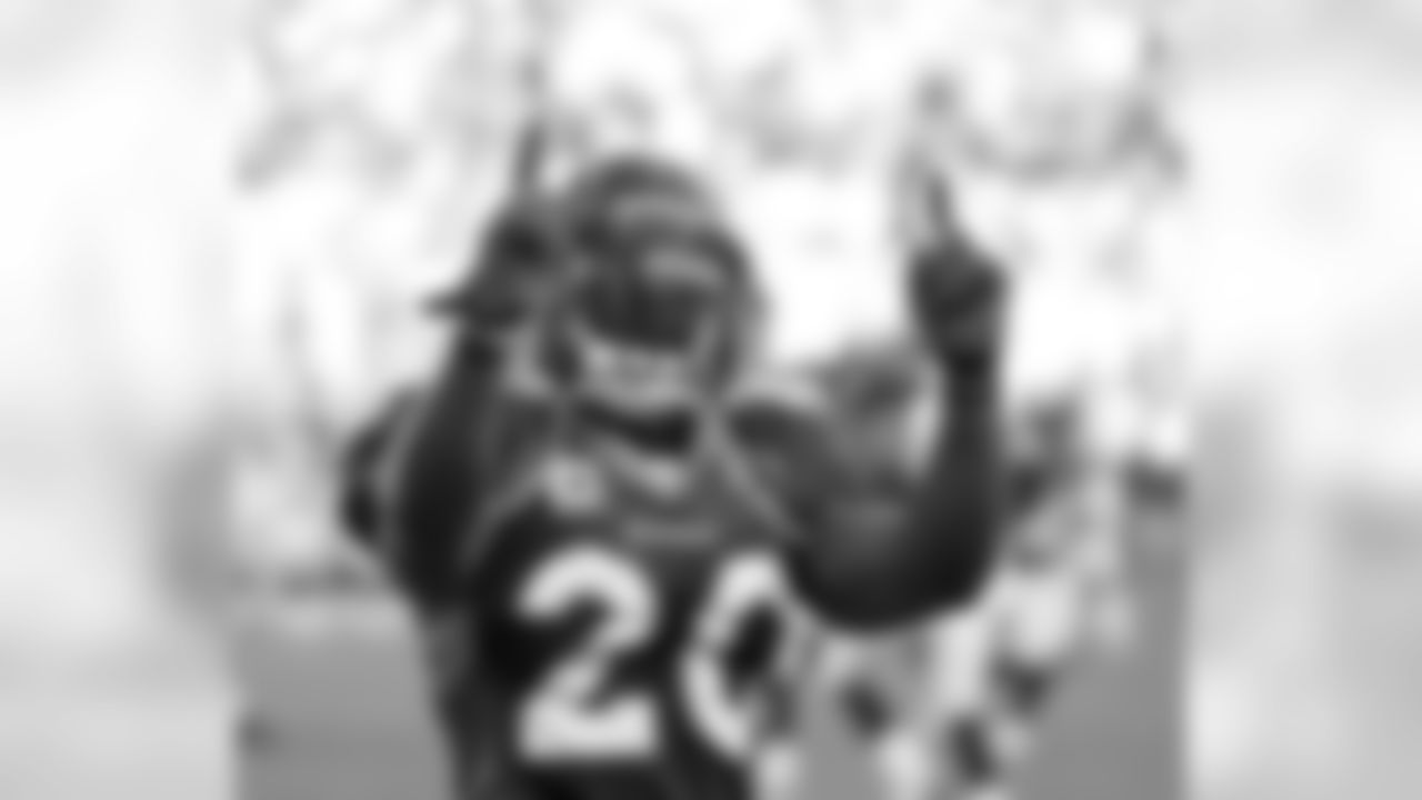 Denver Broncos Brian Dawkins (20) flashes one-and-one fingers to the fans after Denver defeated the Cincinnati Bengals 24-22 in the NFL game September 18, 2011 at Sports Authority Field at Mile High in Denver,CO.