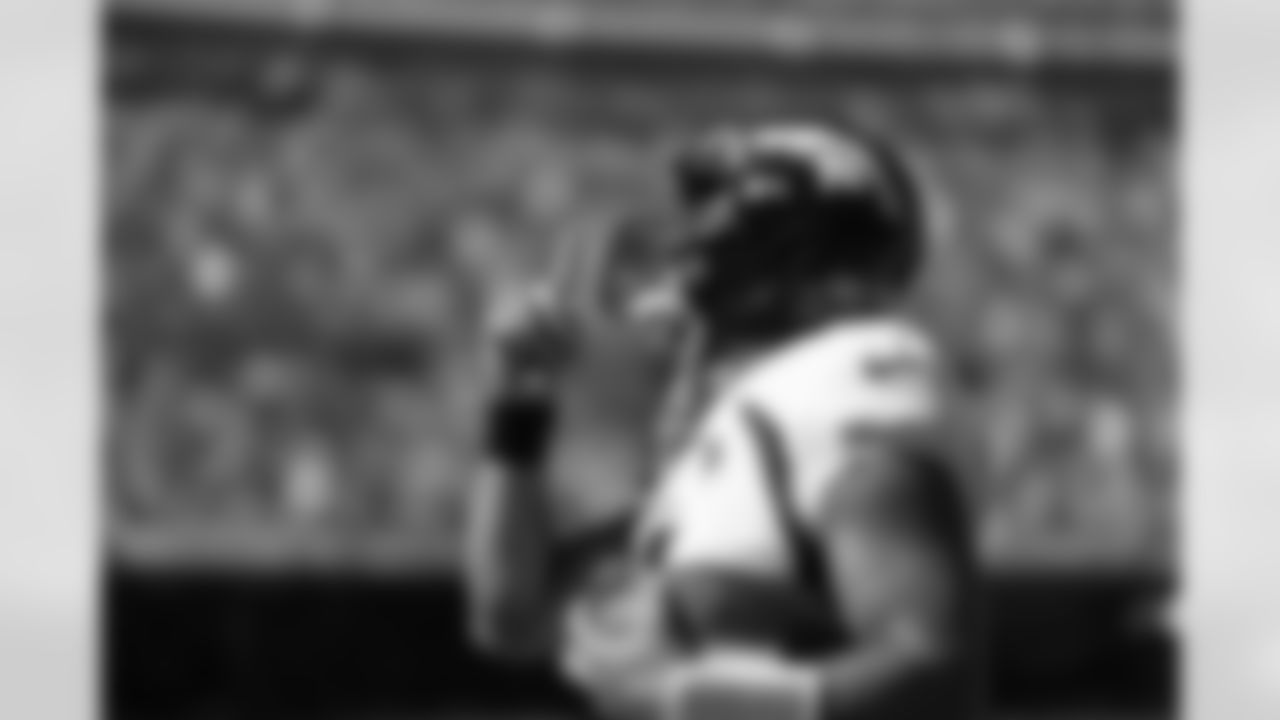 Denver Broncos quarterback Russell Wilson (3) prays before the Broncos' Week 4 game against the Chicago Bears at Soldier Field in Chicago, Illinois on October 1, 2023. Photo by Ben Swanson / Denver Broncos