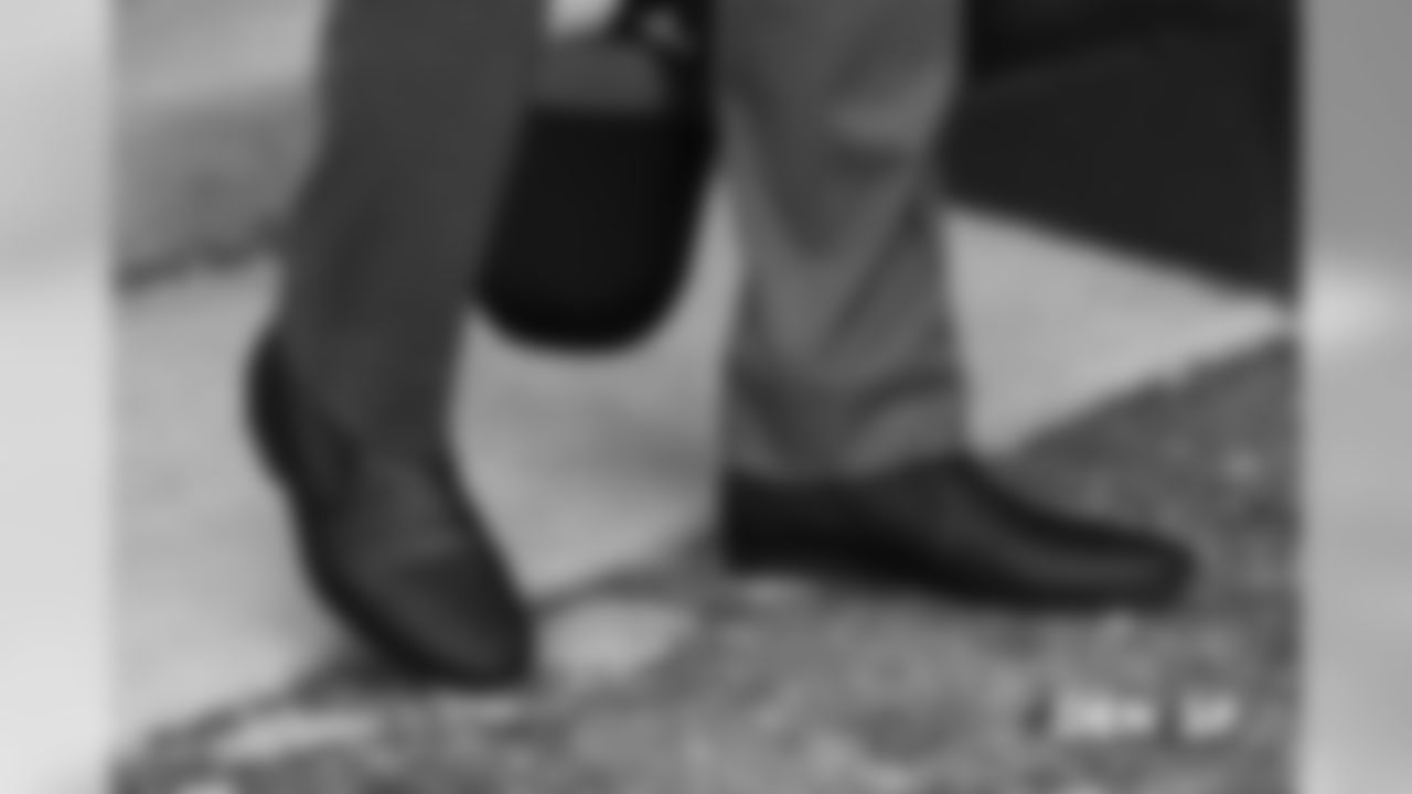 A look at Phillip Lindsay's shoes as he walks to the buses at UCHealth Training Center during the team's travel to San Francisco on December 8, 2018 for their Week 14 game against the 49ers.