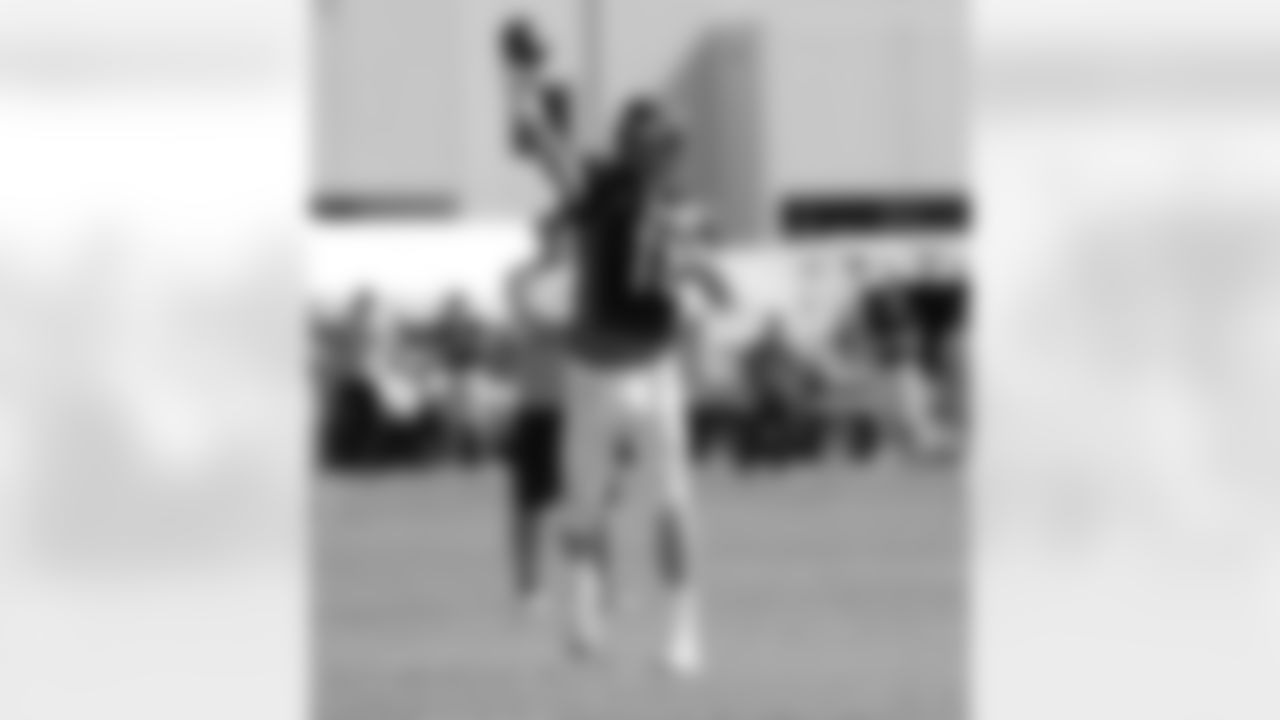 Manning throws a pass.