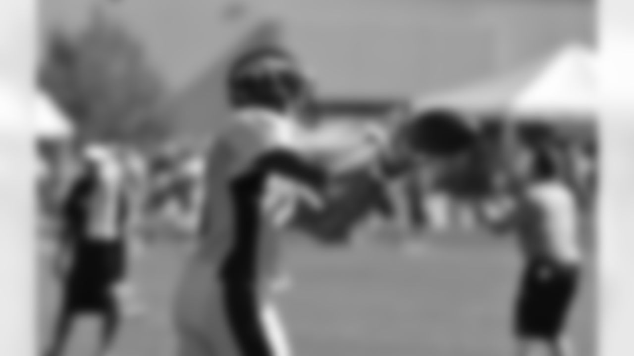 WR Andre Caldwell makes a catch during practice.