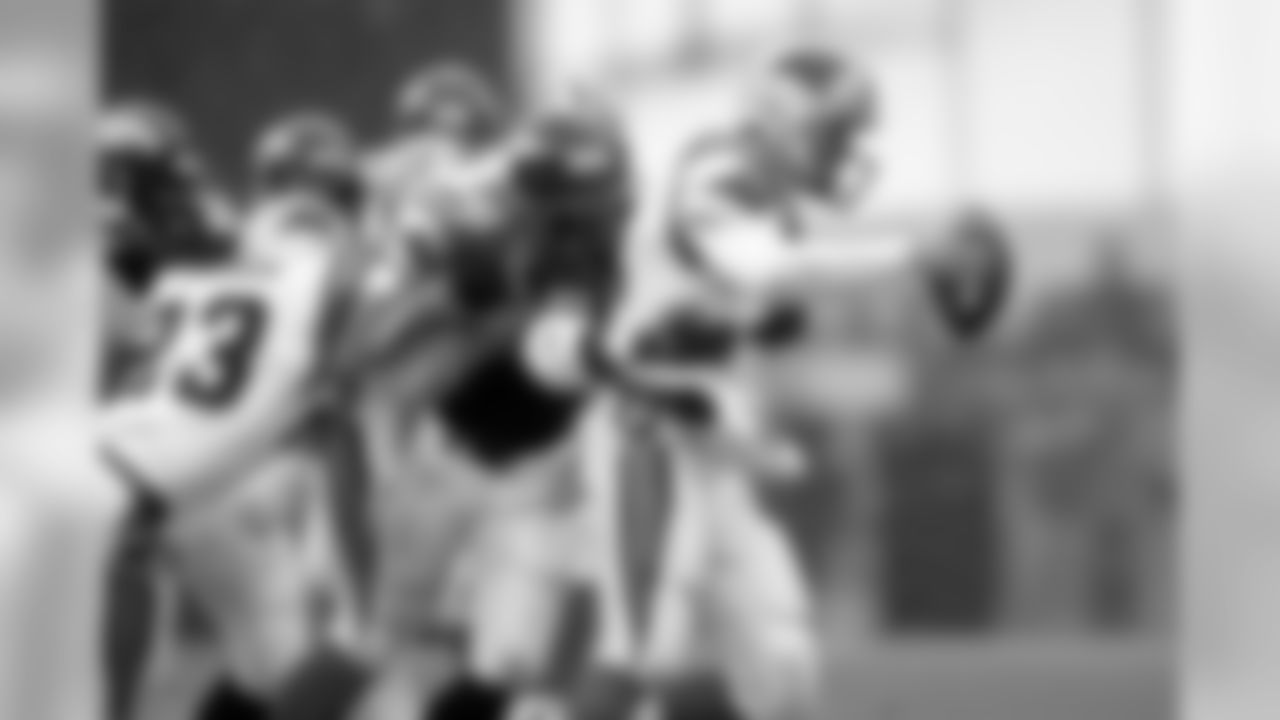 Denver Broncos linebacker John Mobley (51) sacks Carolina Panthers quarterback Kerry Collins (12) during an NFL game on November 9,1997. The Broncos defeated the Panthers 34-0. (Peter Read Miller via AP)