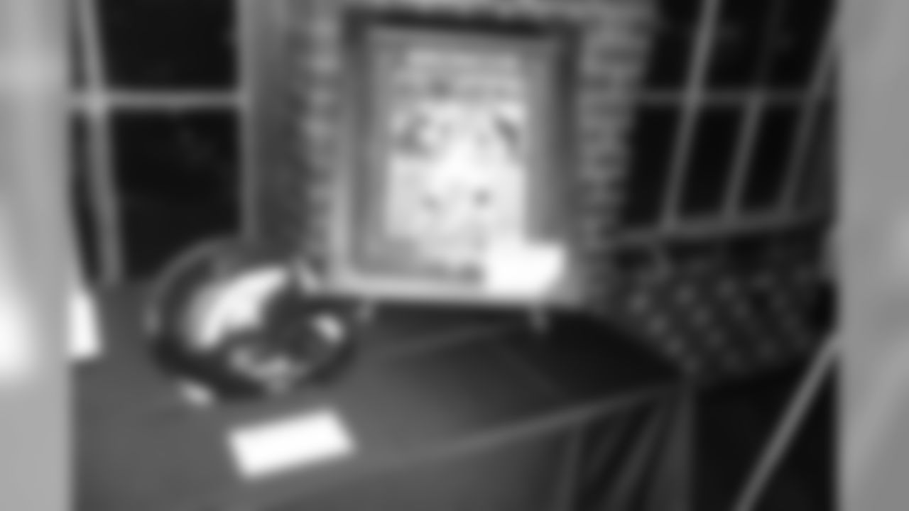 A signed Champ Bailey helmet and John Elway picture during Von's Vision at Mile High Station in Denver on November 5, 2018.