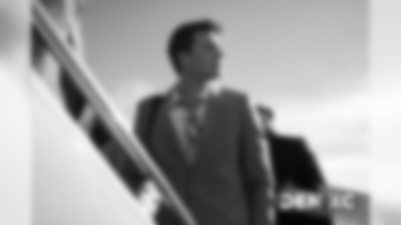 Drew Lock on the tarmac at Denver International Airport during the team's travel to Missouri on December 14, 2019 ahead of their Week 15 game against the Kansas City Chiefs. (Photo by Ben Swanson)
