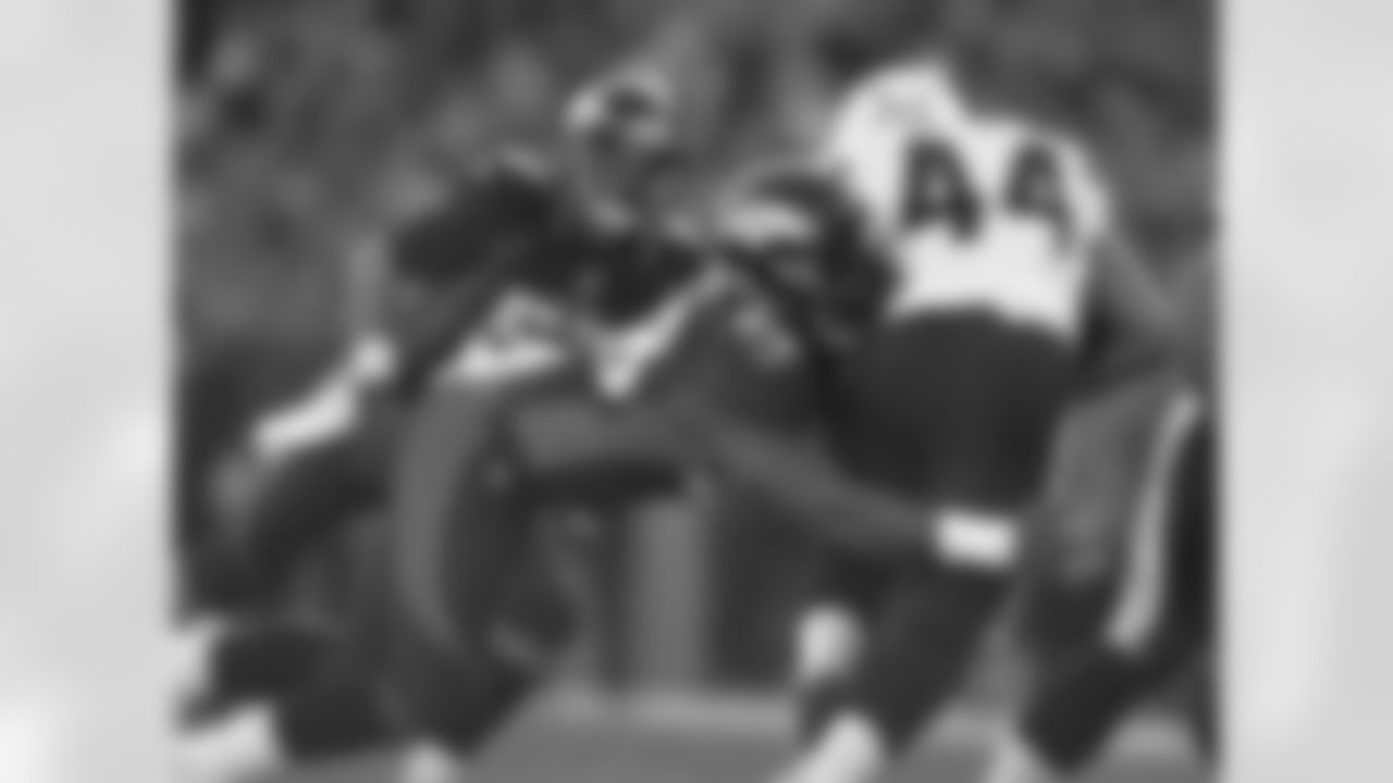 Miller brings down San Diego RB Jackie Battle.