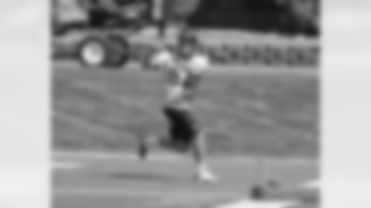 TE Lucas Reed looks in a pass.