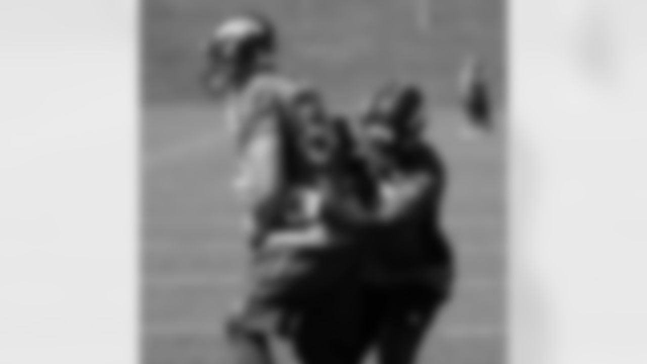 Derek Wolfe and DeMarcus Ware