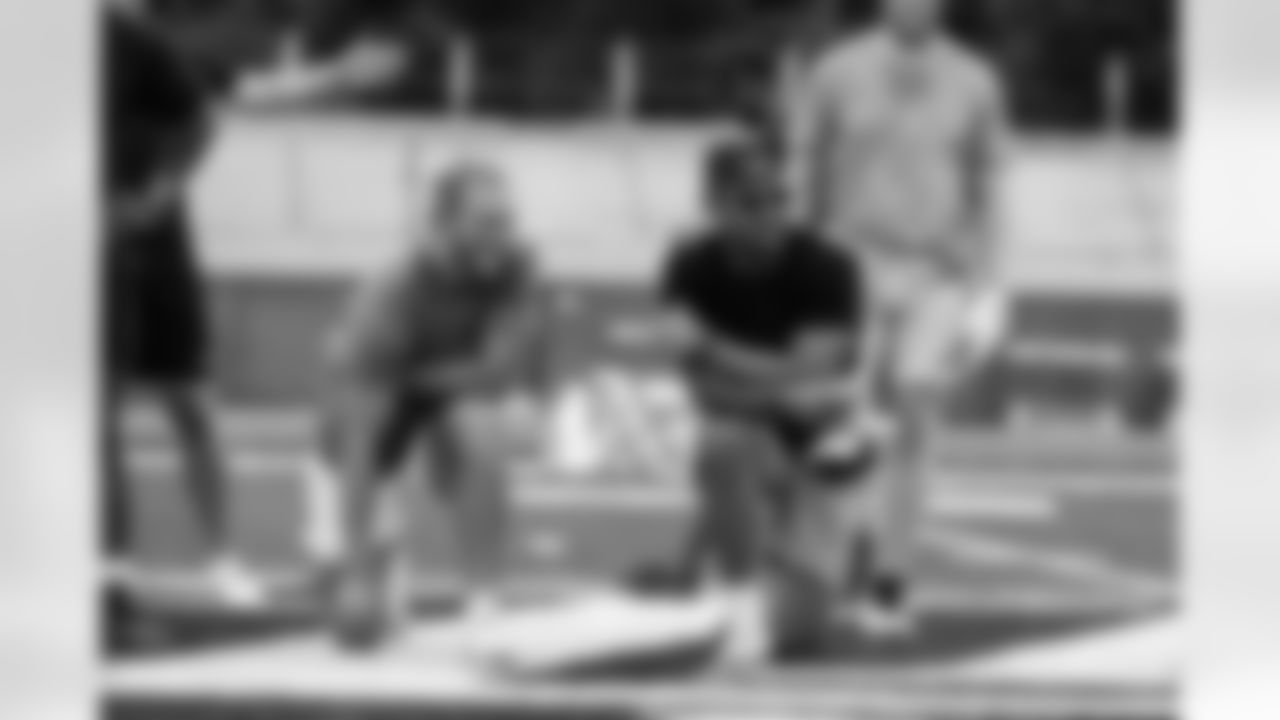 Noah Fant takes part in a workout and training session at Tight End University, a summit organized for NFL tight ends to learn from one another. Here, Fant talks with his former college teammate T.J. Hockenson.