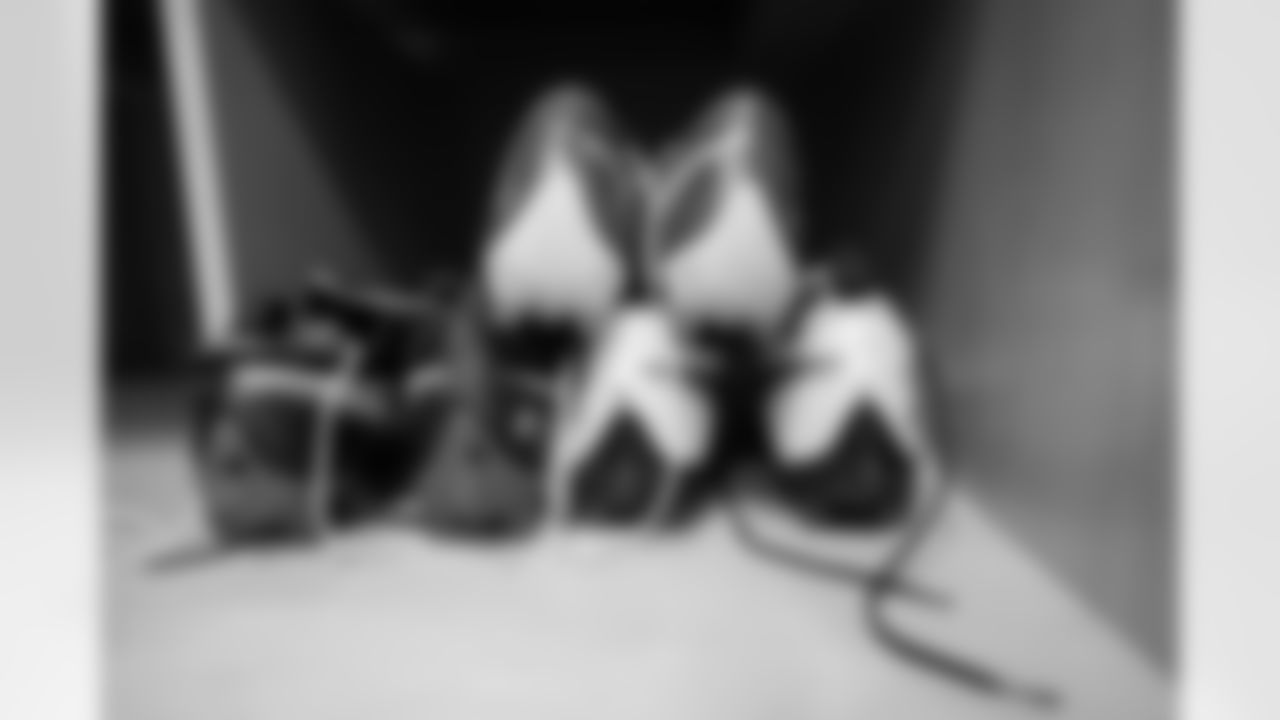 Diontae Spencer's cleats in the locker room before the Broncos' preseason Week 3 game against the Los Angeles Rams at Empower Field at Mile High in Denver, Colorado on August 28, 2021. (Photo by Ben Swanson)