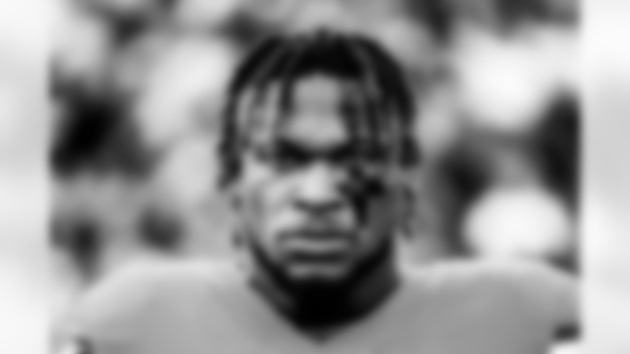 Kenny Young during the national anthem before the Broncos' Week 10 game against the Philadelphia Eagles at Empower Field at Mile High in Denver, Colorado on November 14, 2021. (Photo by Ben Swanson)