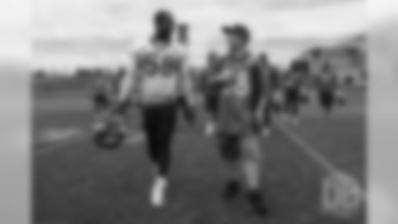 TJ, a 12-year-old fighting cystic fibrosis, wanted to be Von Miller for a day, and the Make-A-Wish Foundation helped make that dream come true on September 29, 2018. Here, TJ meets Miller after practice.