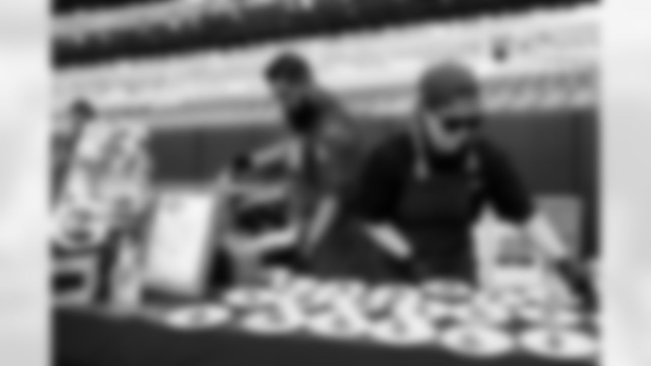 Chefs prepare food at the seventh annual Taste of the Broncos event at Empower Field at Mile High on September 13, 2021. (Photo by Gabriel Christus)