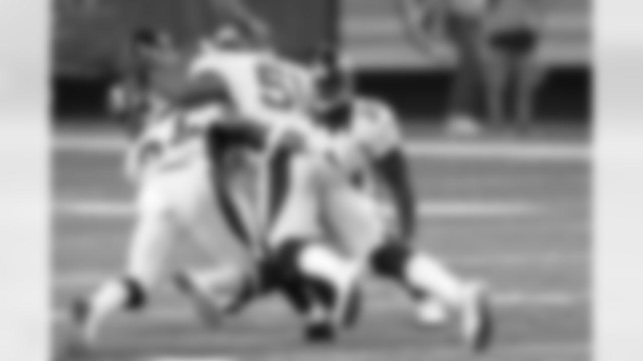 LB Joe Mays and his teammates gang tackle the Falcons ball carrier.