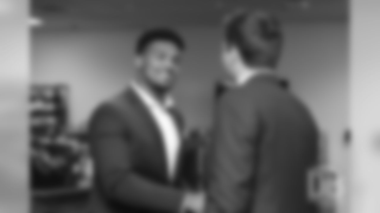 Dre'Mont Jones greets Drew Lock during the arrival tour for Day 2 picks at UCHealth Training Center on April 27, 2019 after the Broncos drafted them in the 2019 NFL Draft.