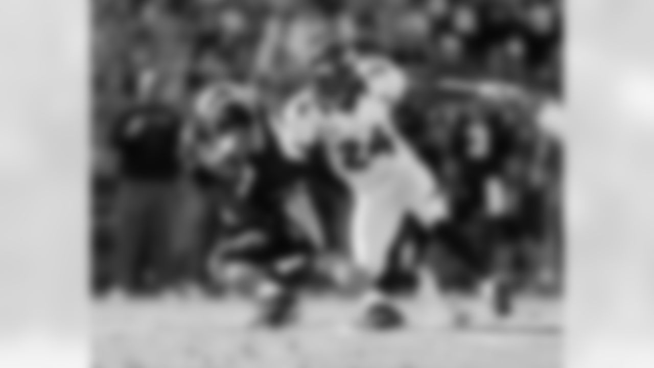 Cornerback Champ Bailey helped the Broncos have a dominant defensive day with seven sacks and two interceptions, punctuated by a interception returned for a touchdown by Tony Carter.