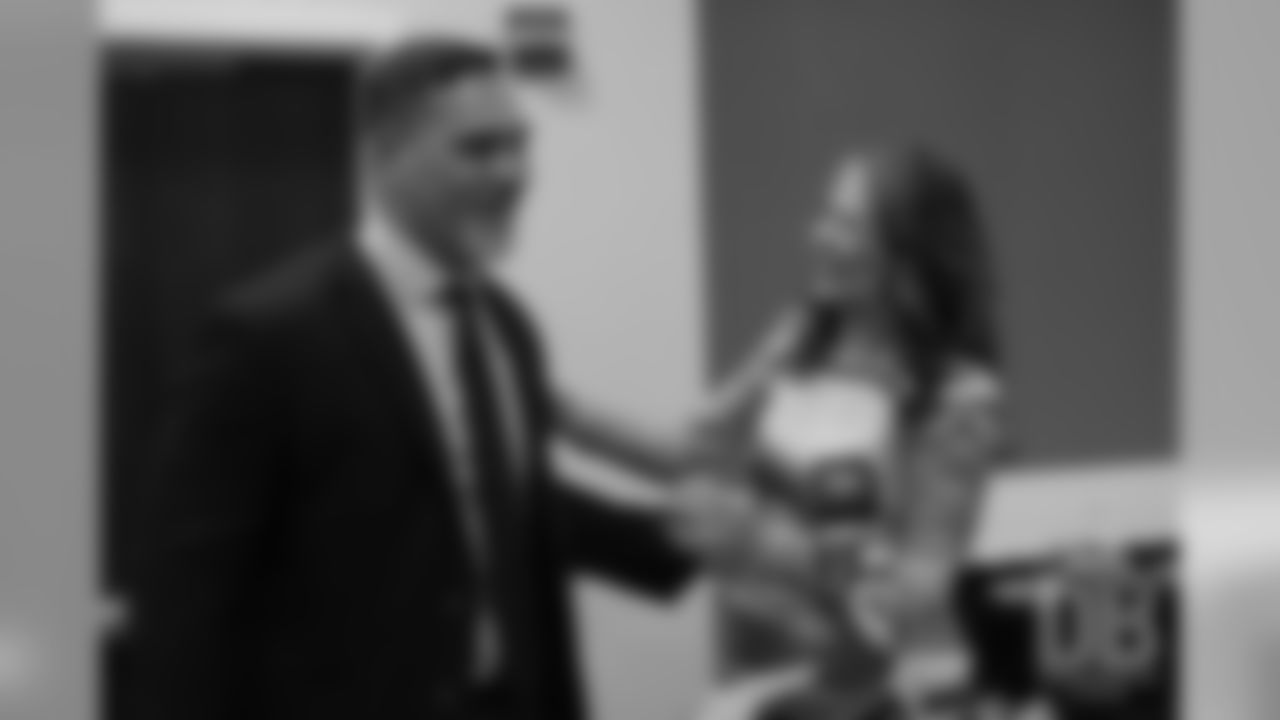 Beth Bowlen Wallace greets Kevin Mawae after the announcement of the Pro Football Hall of Fame's Class of 2019 on February 2, 2019.