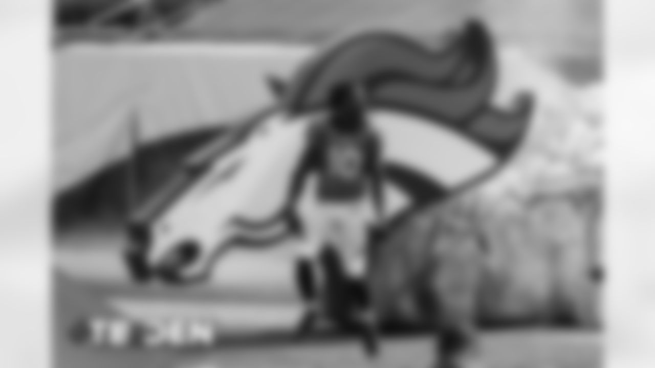 Jerry Jeudy runs out of the tunnel before for the Broncos' Week 3 game against the Tampa Bay Buccaneers at Empower Field at Mile High on September 27, 2020. (Photo by Ben Swanson)