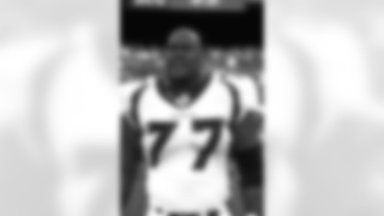 Tony Jones watches the action on the field against the Kansas City Chiefs at Arrowhead Stadium in Kansas City, MO on September 19, 1999.