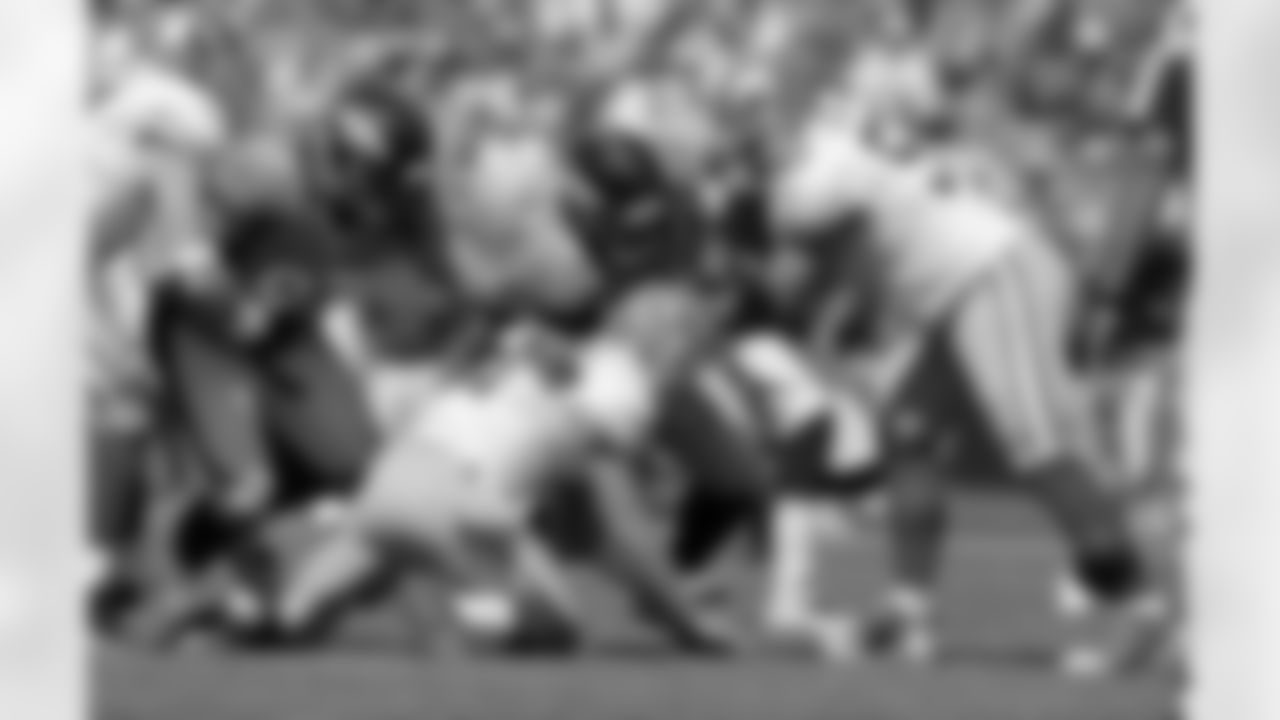 Defensive tackle Kevin Vickerson fights to get his hands on a San Francisco fumble.