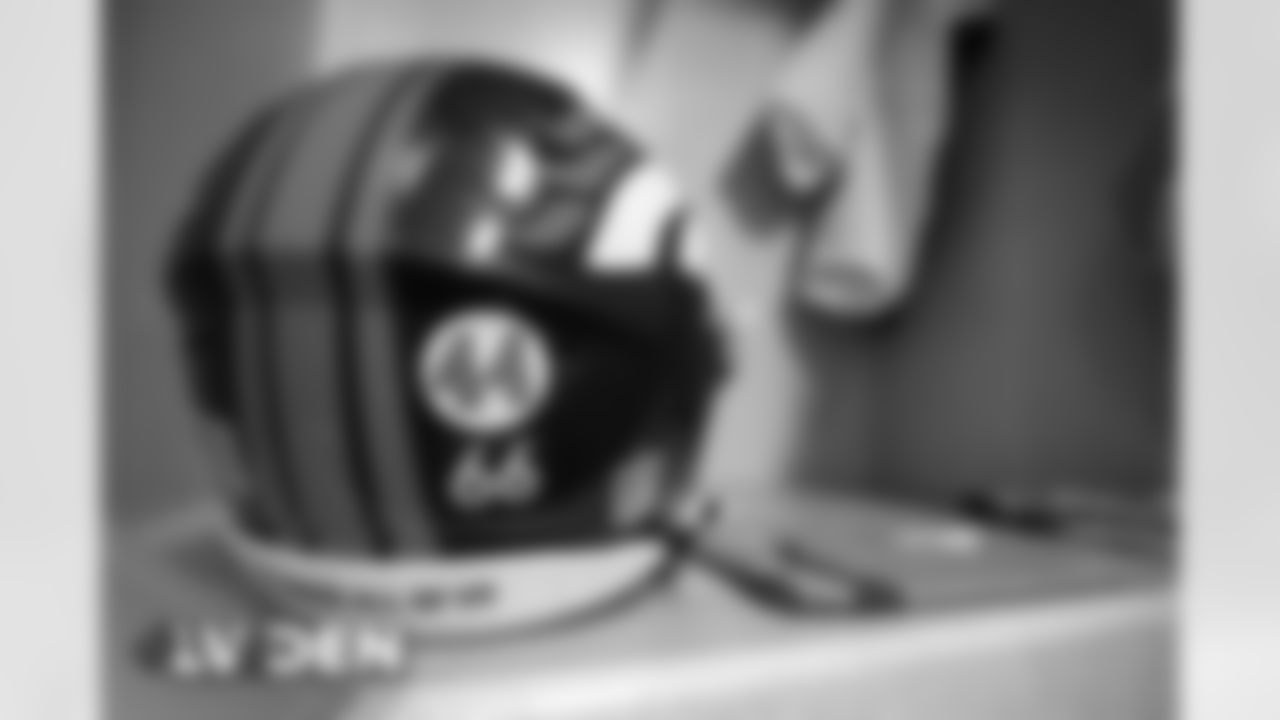 Dalton Risner's helmet, featuring a decal in honor of Floyd Little, in the locker room before the Broncos' Week 17 game against the Las Vegas Raiders at Empower Field at Mile High in Denver, Colorado on January 3, 2021. (Photo by Joe Abdellah)