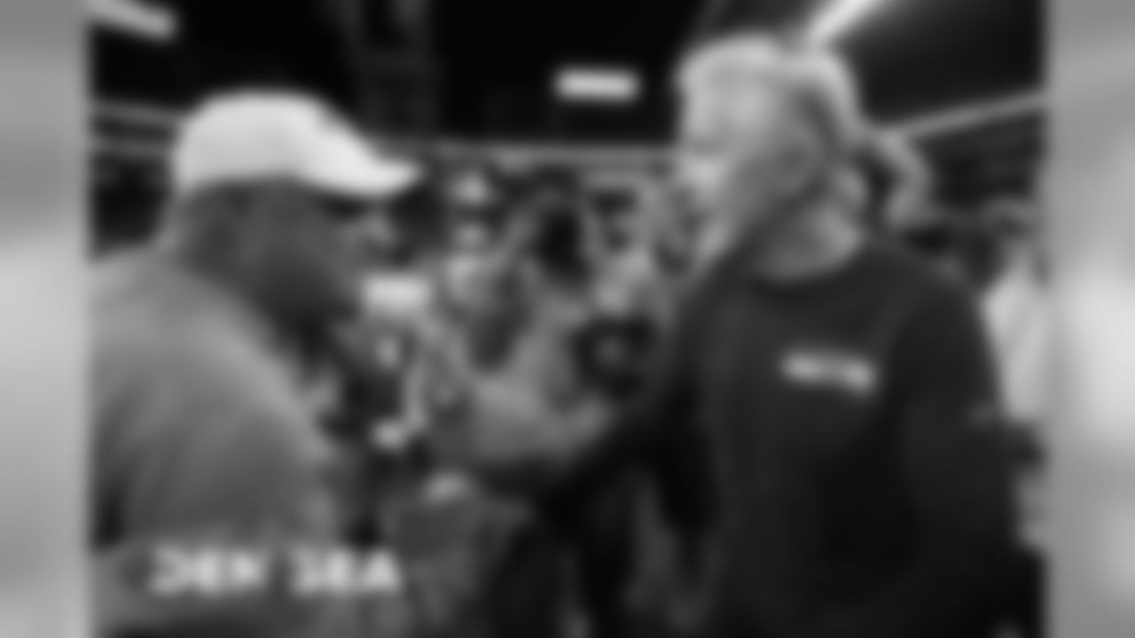 Head Coach Vic Fangio greets Seahawks head coach Pete Carroll during the second half of a preseason game against the Seattle Seahawks at CenturyLink Field in Seattle on August 8, 2019.