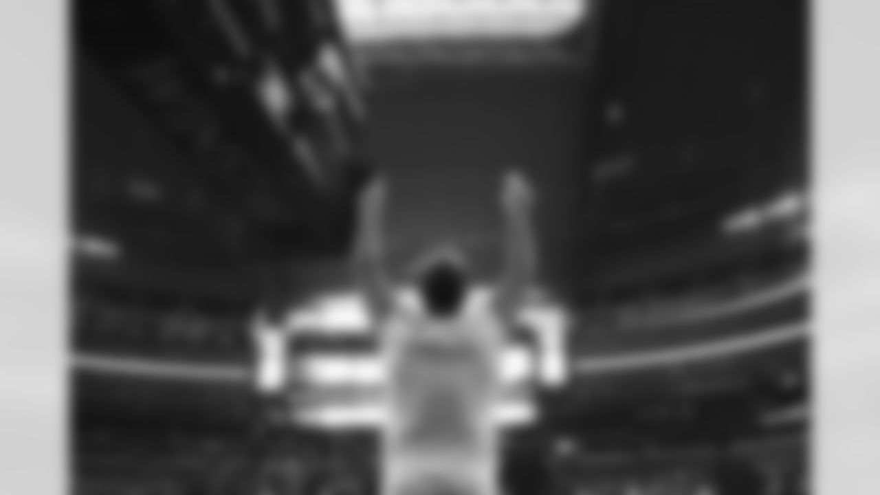 Dalton Risner points to the heavens as he warms up before the game against the Dallas Cowboys on Sunday, November 7, 2021 at AT&T Stadium in Arlington, Texas.
Photo by Gabriel Christus