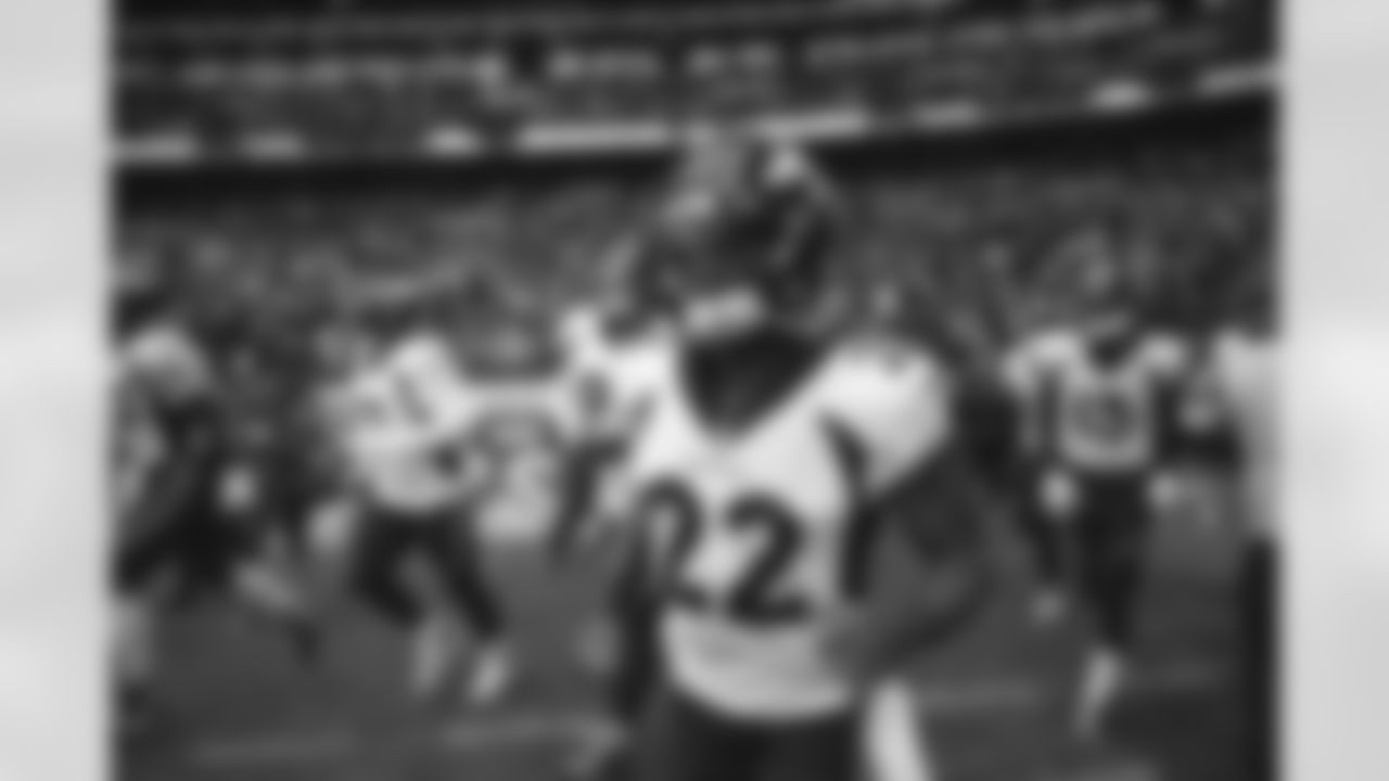 Kareem Jackson runs out of the tunnel during the Broncos' Week 8 game against the Jaguars at Wembley Stadium in London on October 30, 2022. This image is part of the Broncos' film series documenting the team's trip to London. (Photo by Ben Swanson)