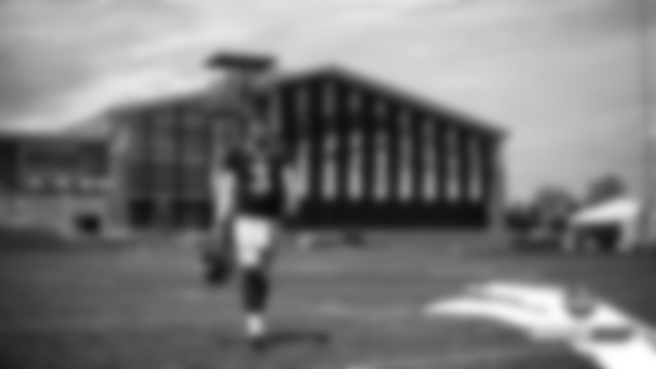 Drew Lock walks off the field after practice on Day 7 of training camp on July 25, 2019.