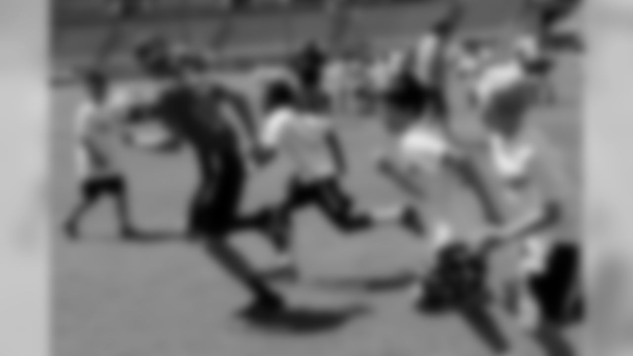 Kids of all ages participated in a series of drills to help them learn and understand proper football fundamentals.
